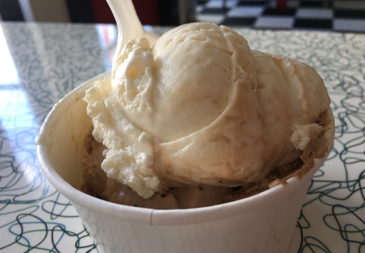 Scoops of ice cream in a paper cup